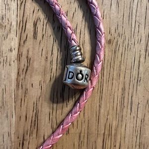Pink Pandora wrap bracelet.